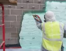 commercial spray foam insulation being applied