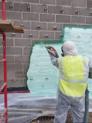 commercial spray foam insulation being applied